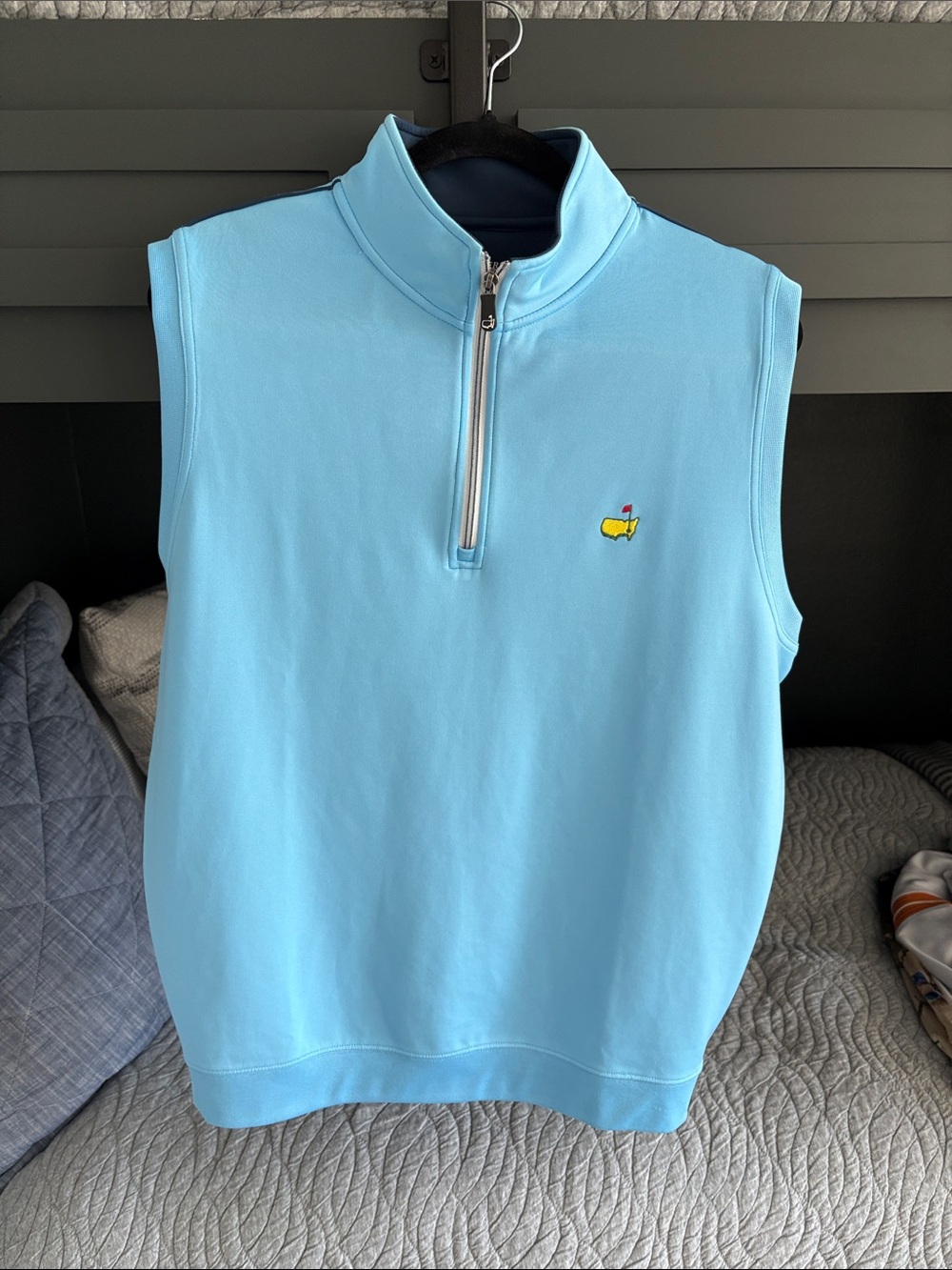 Masters Light Blue Sleeveless Quarter-Zip Golf Vest with Yellow Logo
